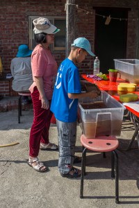 boy and mom making paper