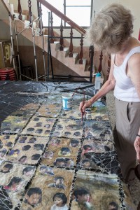 Jane making side with children