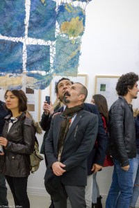 PEOPLE LOOK AT WORLD MAP AT OPENING_MG_9617