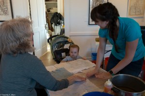 baby helping to pat paper dry IMG_3853