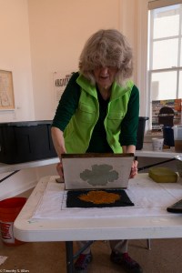 Jane with couched poppy on blue background for quilt block IMG_3297