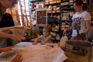 many hands and girl helping to dry square IMG_3924