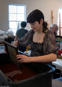 participant dipping into poppy vat IMG_3727