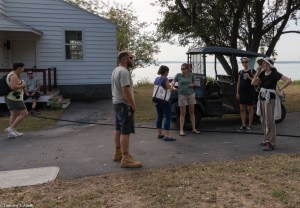 Jane and park's staff talking about the residency project at the chapel area on Peddock's Island.