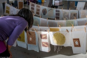 looking-at-handmade-paper-drying-on-line-img_8085