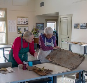 looking-at-textured-piece-of-wood-to-use-for-drying-paper-for-embossment-img_7972